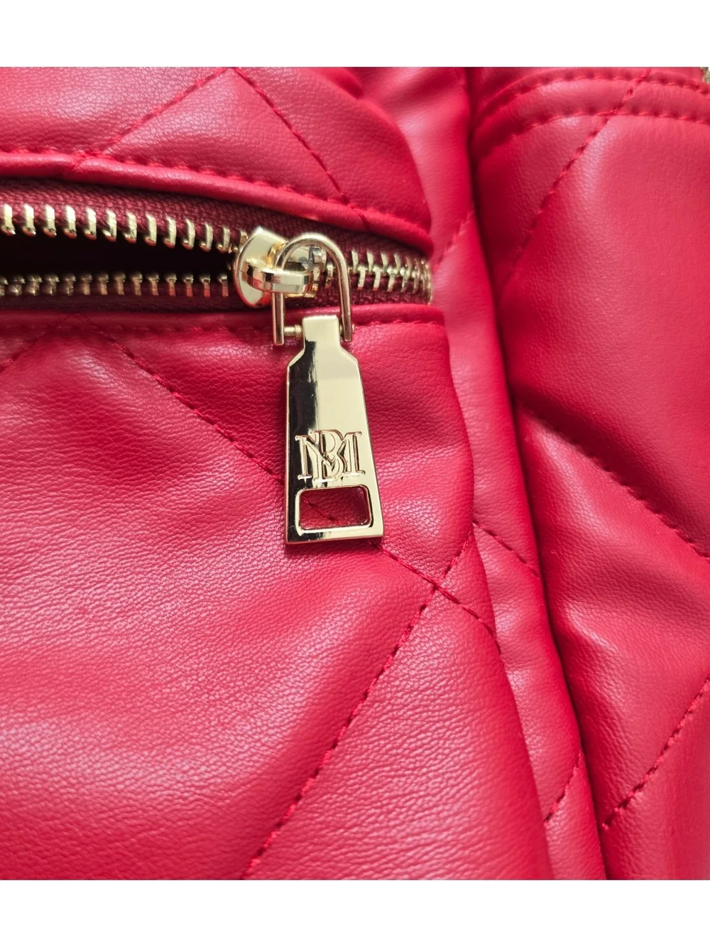 Badgley Mischka quilted designer